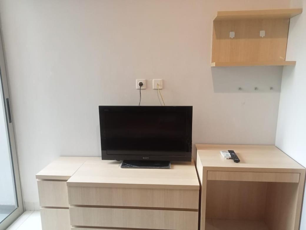 Gin Apartemen