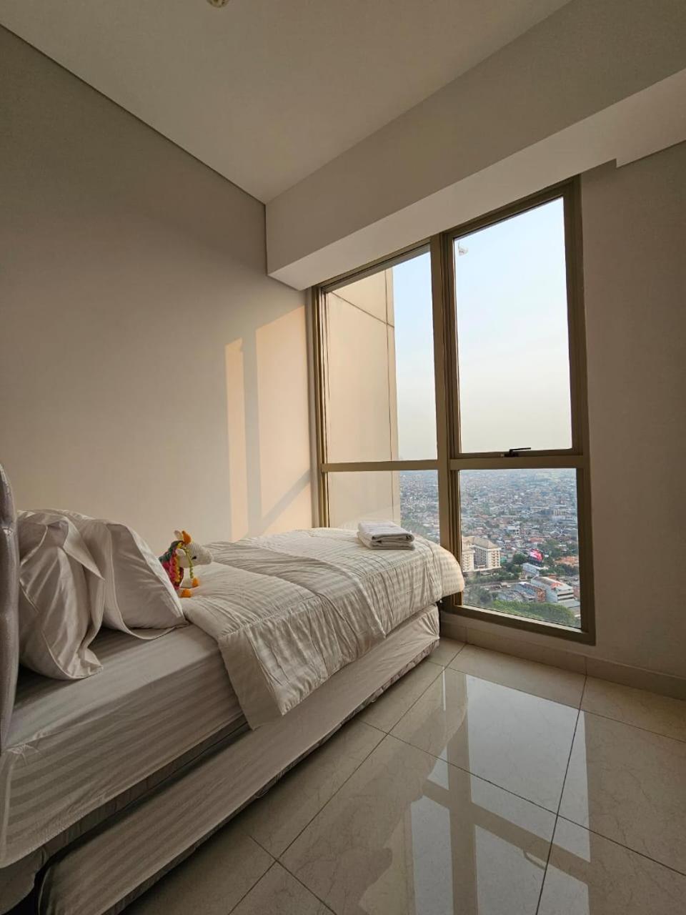 Gin Apartemen