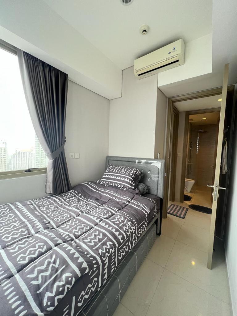 Gin Apartemen